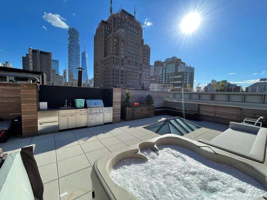 Photo #2 of Greene Penthouse | Soho 2BR Penthouse with Private Hot Tub